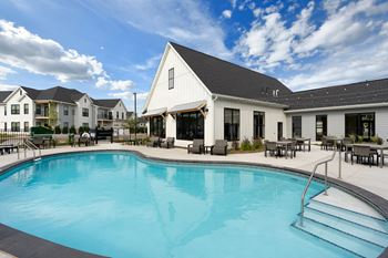 Sparkling outdoor pool with sundeck